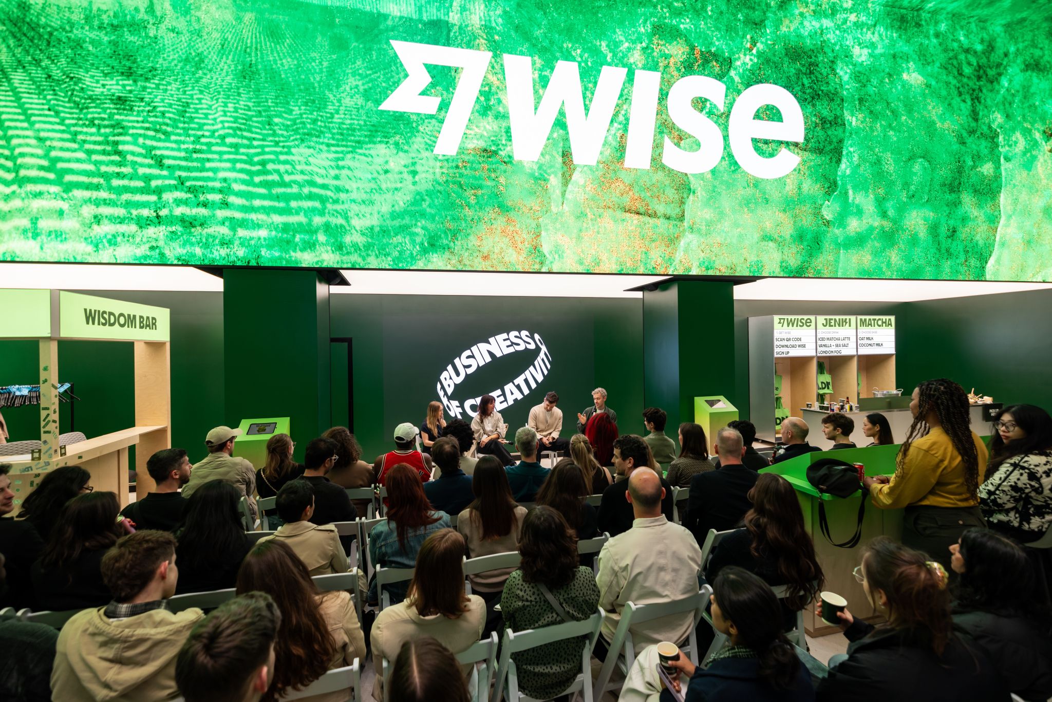 Audience watching the business of creativity talk at Wise